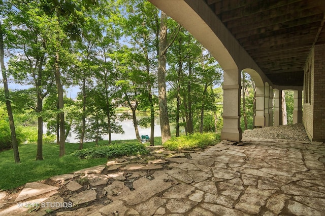 view of patio / terrace with a water view