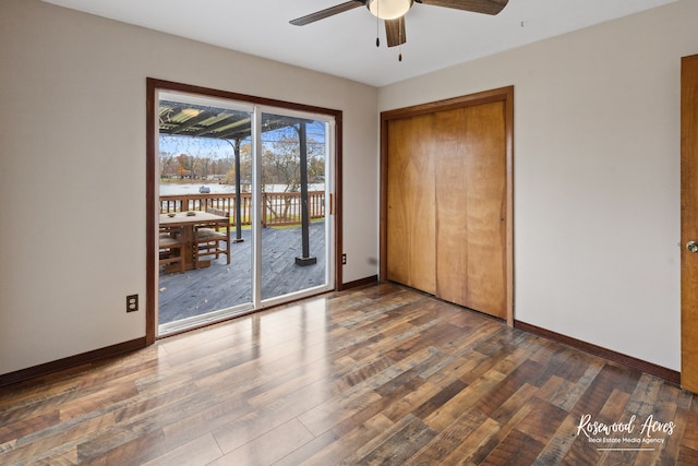 unfurnished bedroom with hardwood / wood-style floors, ceiling fan, access to outside, and a closet