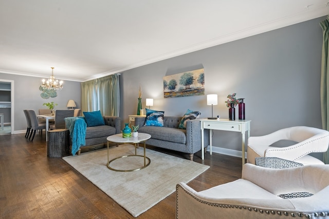 living room with an inviting chandelier, dark wood-type flooring, and crown molding