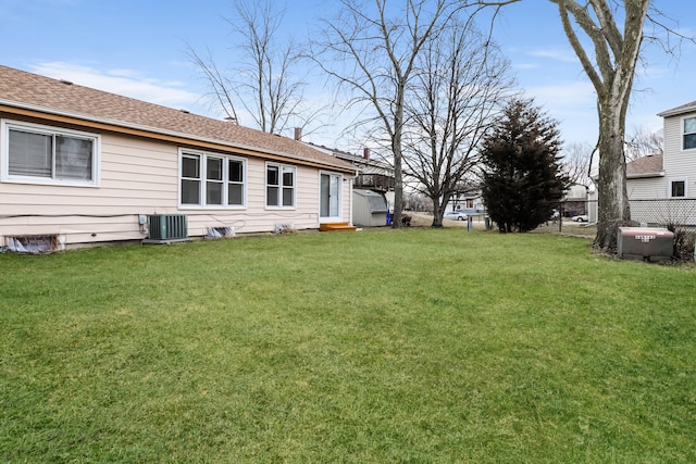 view of yard with central AC unit