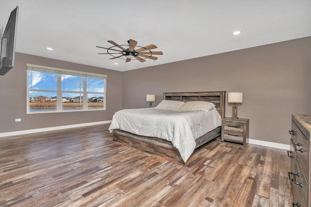 bedroom featuring ceiling fan and hardwood / wood-style floors