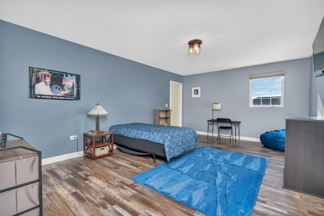 bedroom featuring hardwood / wood-style floors