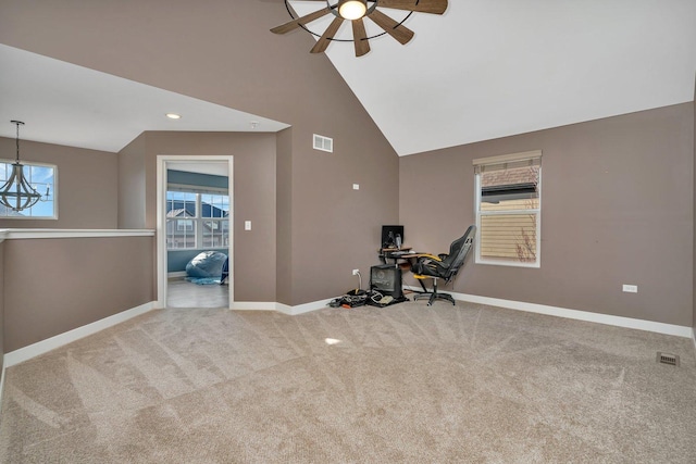 interior space featuring carpet floors, high vaulted ceiling, and ceiling fan