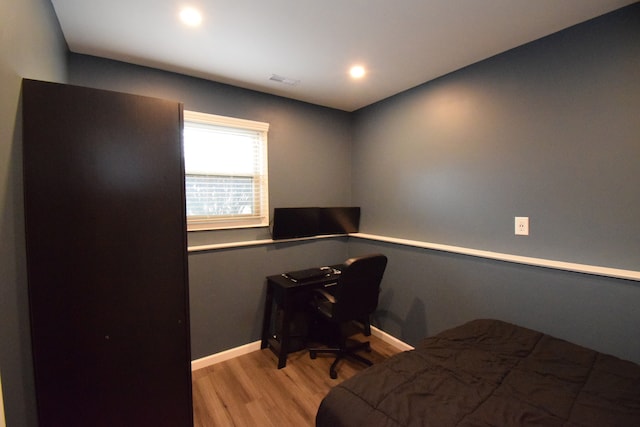 bedroom featuring light hardwood / wood-style floors