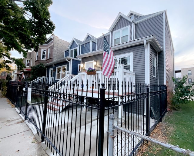 view of front of home featuring a wooden deck