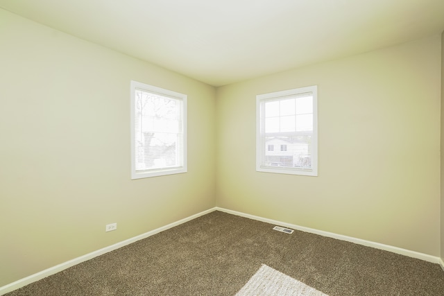 view of carpeted spare room