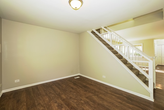 interior space with dark hardwood / wood-style flooring