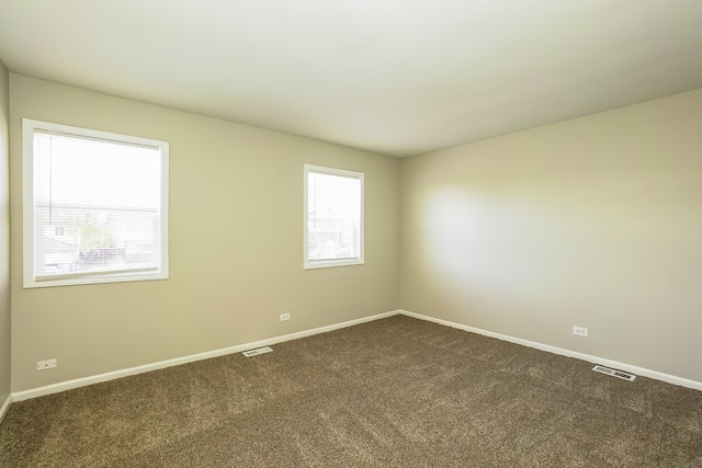 spare room with carpet floors