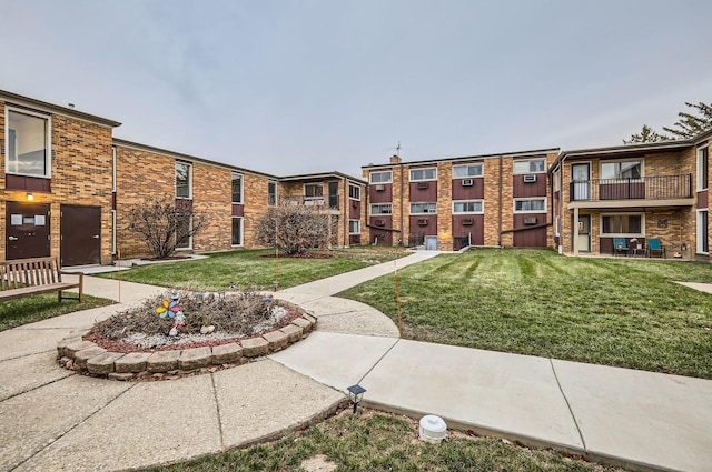 view of community featuring a lawn