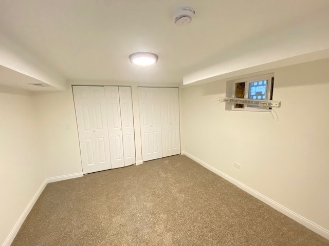 basement featuring carpet floors