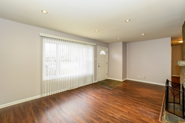 foyer entrance with dark wood-type flooring