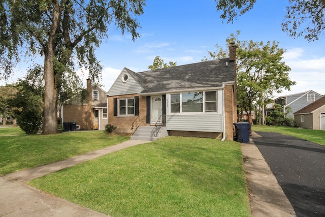 bungalow with a front lawn