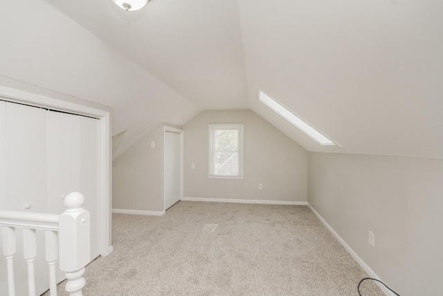 3632 212th Pl, Matteson, IL 60443 - additional living space featuring carpet, lofted ceiling, a skylight, and baseboards