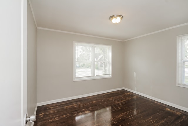 unfurnished room with crown molding and dark hardwood / wood-style flooring