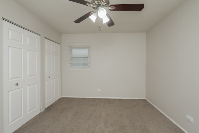 unfurnished bedroom with light carpet and ceiling fan