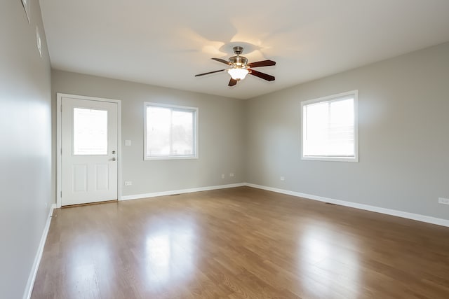 spare room featuring ceiling fan and wood-type flooring