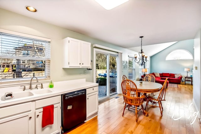 kitchen with dishwasher, white cabinets, and light hardwood / wood-style floors