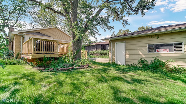 view of yard featuring a deck