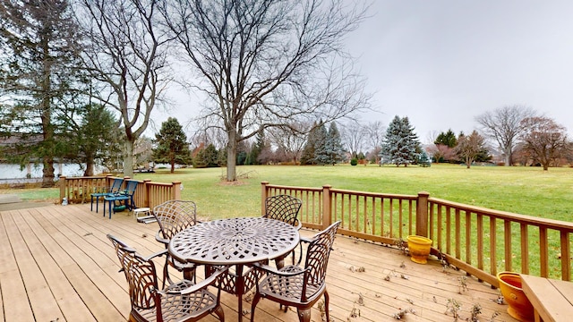 wooden deck with a yard