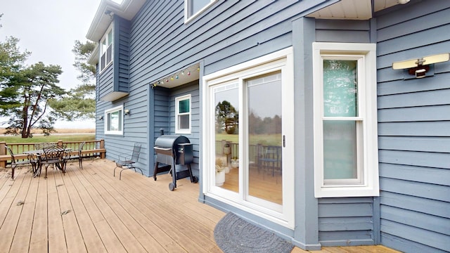 wooden deck with grilling area