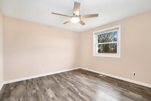 unfurnished room featuring ceiling fan and hardwood / wood-style floors