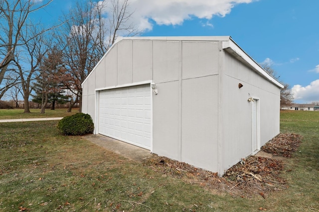 garage with a lawn