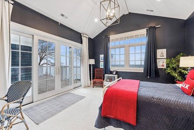 carpeted bedroom with french doors, lofted ceiling, access to outside, and a notable chandelier