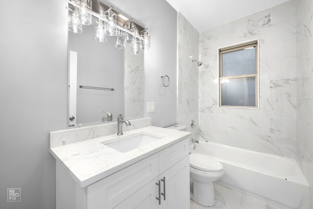 full bathroom with vanity, toilet, and tiled shower / bath combo