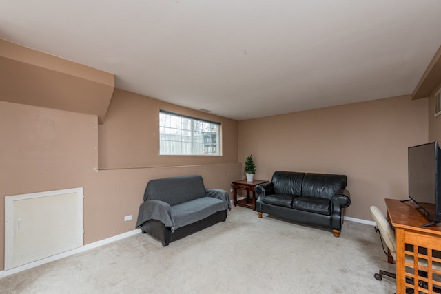 sitting room featuring carpet floors