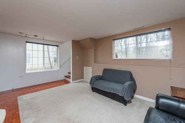 living area with plenty of natural light and parquet flooring