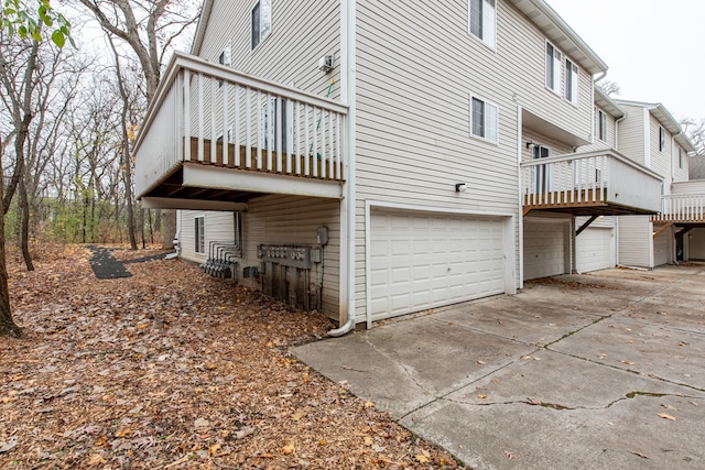 view of property exterior with a garage