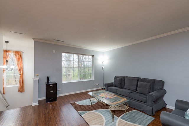 living room with dark hardwood / wood-style flooring and crown molding