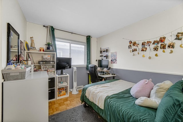 bedroom with parquet flooring