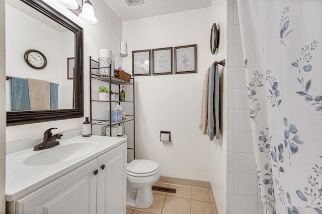 bathroom featuring a shower with curtain, tile patterned floors, toilet, and vanity