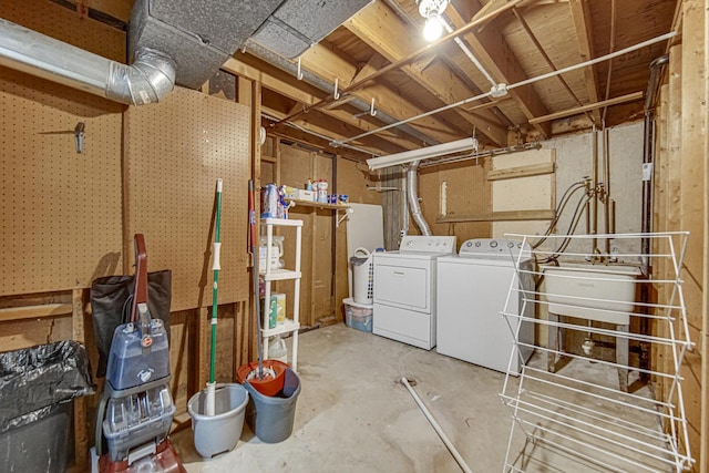 basement featuring sink and independent washer and dryer