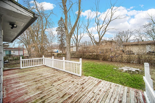 deck featuring a yard