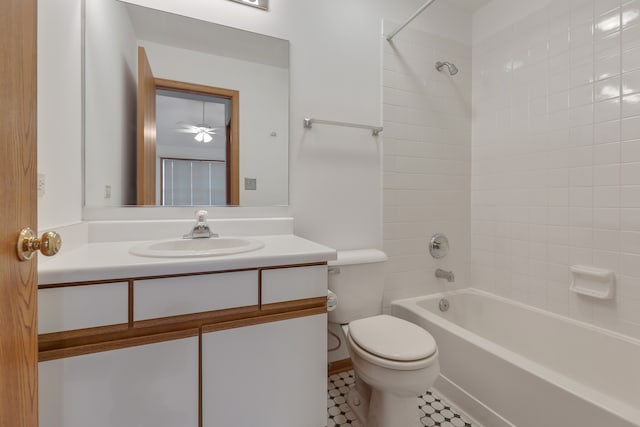 full bathroom with tile patterned floors, vanity, toilet, and tiled shower / bath