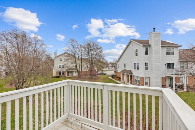 deck featuring a lawn