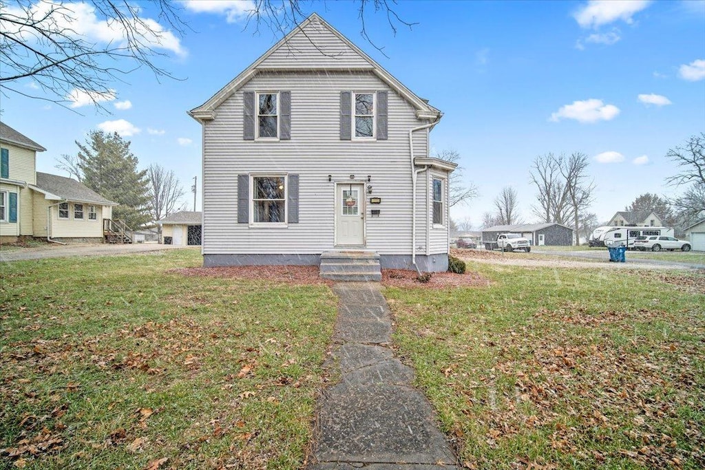 view of front of house featuring a front yard