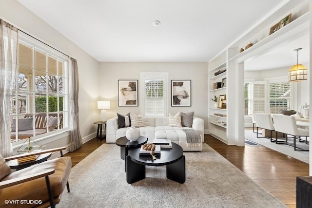 living room with dark hardwood / wood-style floors