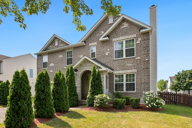 view of front of house with a front lawn