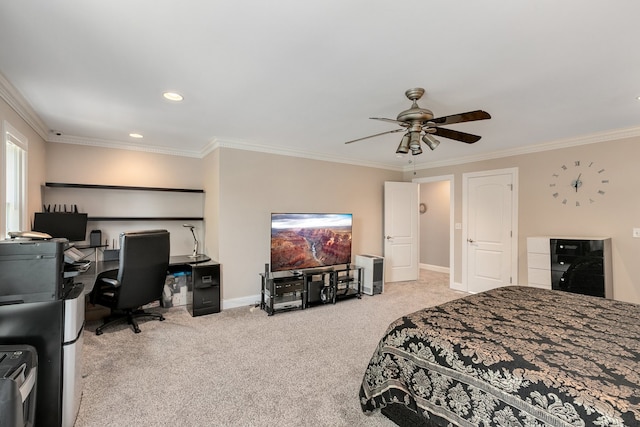 carpeted bedroom featuring ceiling fan and ornamental molding