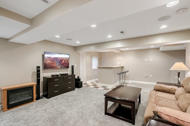 living room featuring light carpet