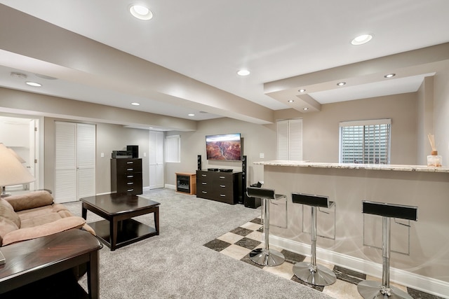 living room featuring light carpet