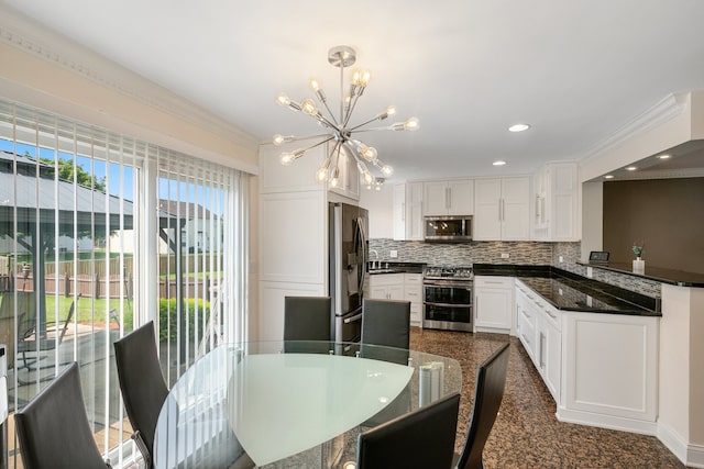 dining area with ornamental molding and an inviting chandelier