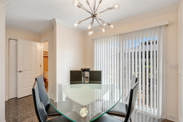 dining space with an inviting chandelier and ornamental molding