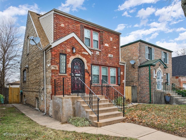 view of front of house with brick siding