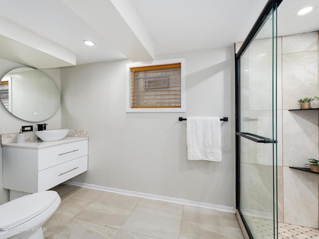 full bathroom featuring a stall shower, vanity, baseboards, and recessed lighting