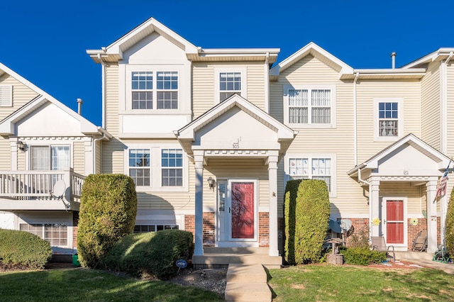 view of front of home with a front yard