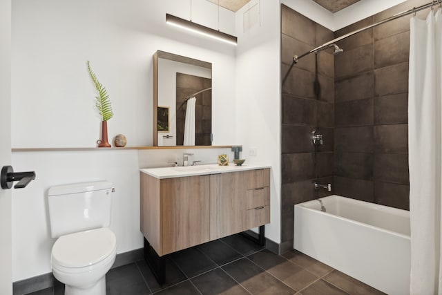 full bathroom featuring tile patterned flooring, shower / bath combo, vanity, and toilet